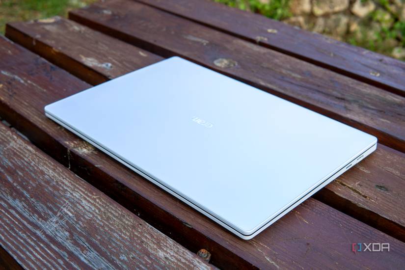 Angled view of the LG Gram Style on a wooden table with the lid closed