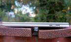Right-side view of the LG Gram Style with the lid closed showing a collpasible USB Type-A port and a microSD card slot