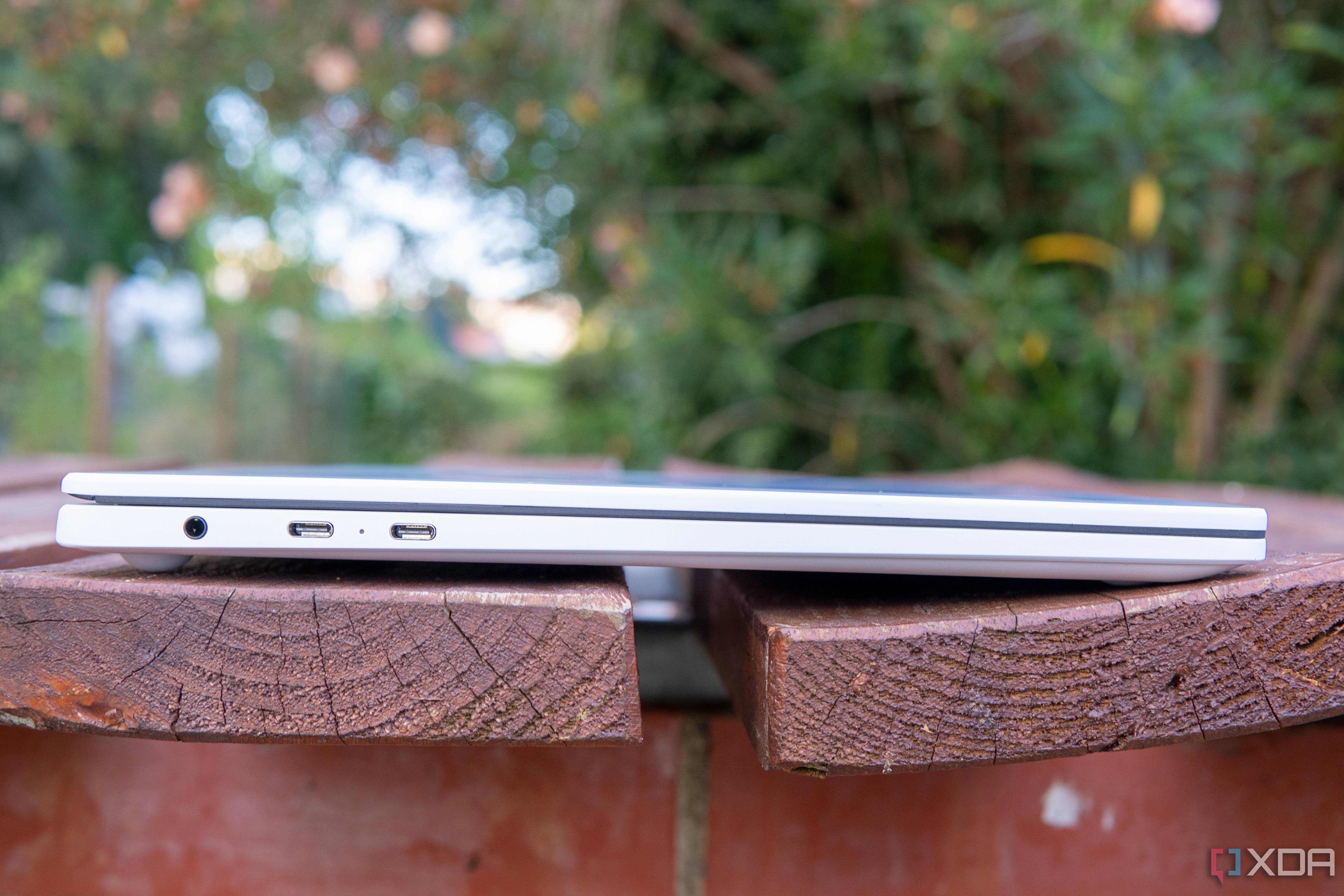 Left-side view of the LG Gram Style with the lid closed showing two Thunderbolt 4 ports and a headphone jack