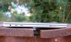 Left-side view of the LG Gram Style with the lid closed showing two Thunderbolt 4 ports and a headphone jack