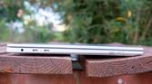 Left-side view of the LG Gram Style with the lid closed showing two Thunderbolt 4 ports and a headphone jack