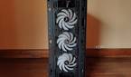 Three War Hammer Kratos fans inside an MSI Forge 110R case.
