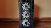 Three War Hammer Kratos fans inside an MSI Forge 110R case.