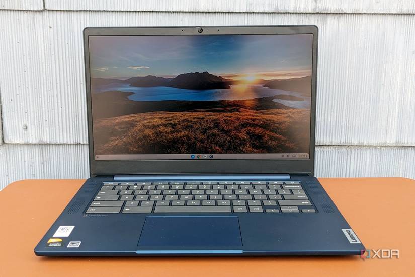 Slim 3 Chromebook sitting on a desk in front of blue tiles