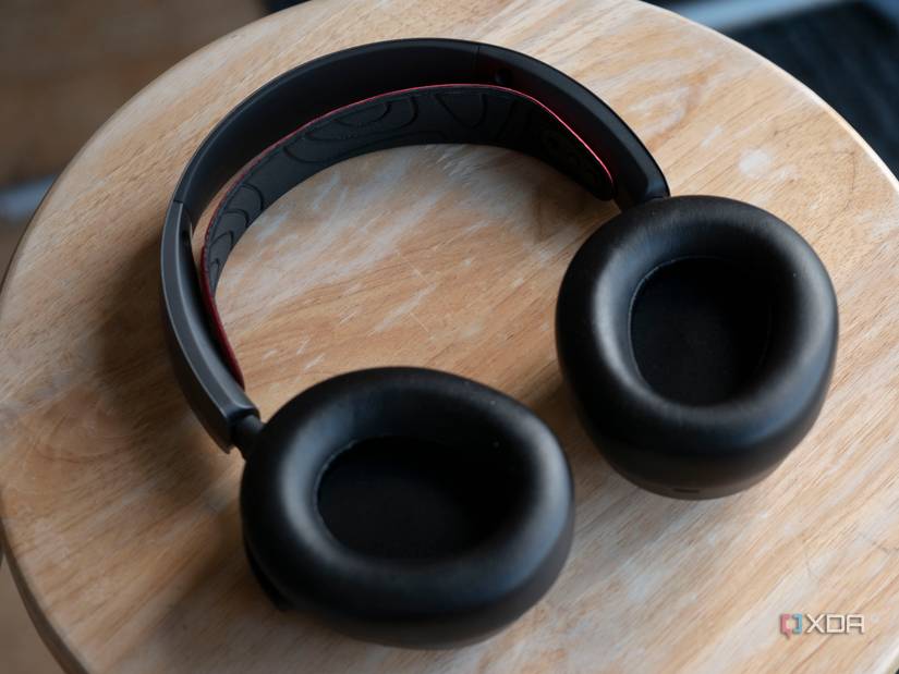 SteelSeries Arctis Nova Pro Wireless with earcups facing up, lying on a table