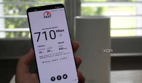TP-Link Deco BE85 mesh system: Netflix's Fast speed test app with 710Mbps down and 830Mbps up, latency 18ms unloaded and 28ms loaded