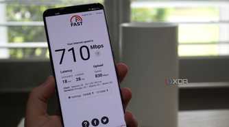 TP-Link Deco BE85 mesh system: Netflix's Fast speed test app with 710Mbps down and 830Mbps up, latency 18ms unloaded and 28ms loaded