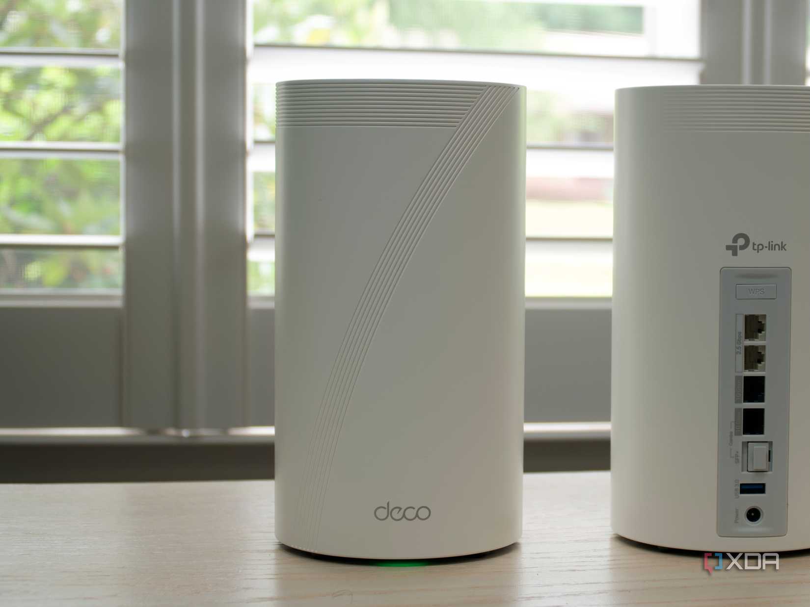 TP-Link Deco BE85 mesh system: Front of the main node and rear of the second node