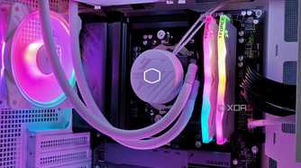 An image showing a white PC case with RGB-enabled components inside.