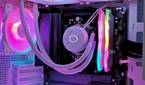 An image showing a white PC case with RGB-enabled components inside.
