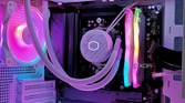 An image showing a white PC case with RGB-enabled components inside.