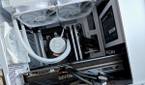 An image showing a bunch of PC parts installed in an Asus Prime AP201 PC case.