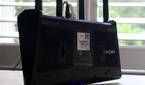 Asus RT-AX57 mounting holes and rubber feet