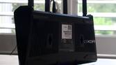 Asus RT-AX57 mounting holes and rubber feet