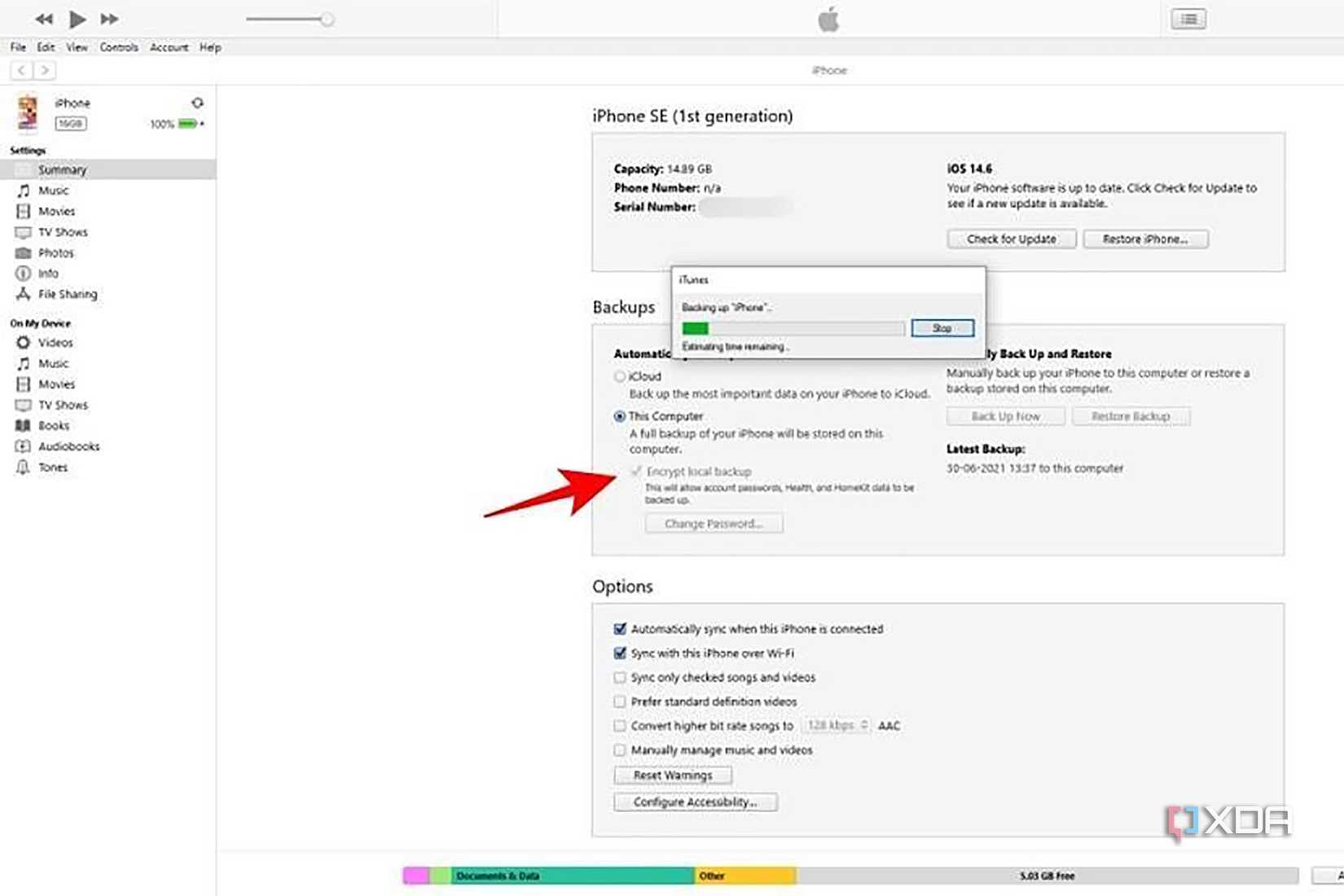 iTunes phone backup page on a Mac with an arrow pointing to the encrypt backup option.