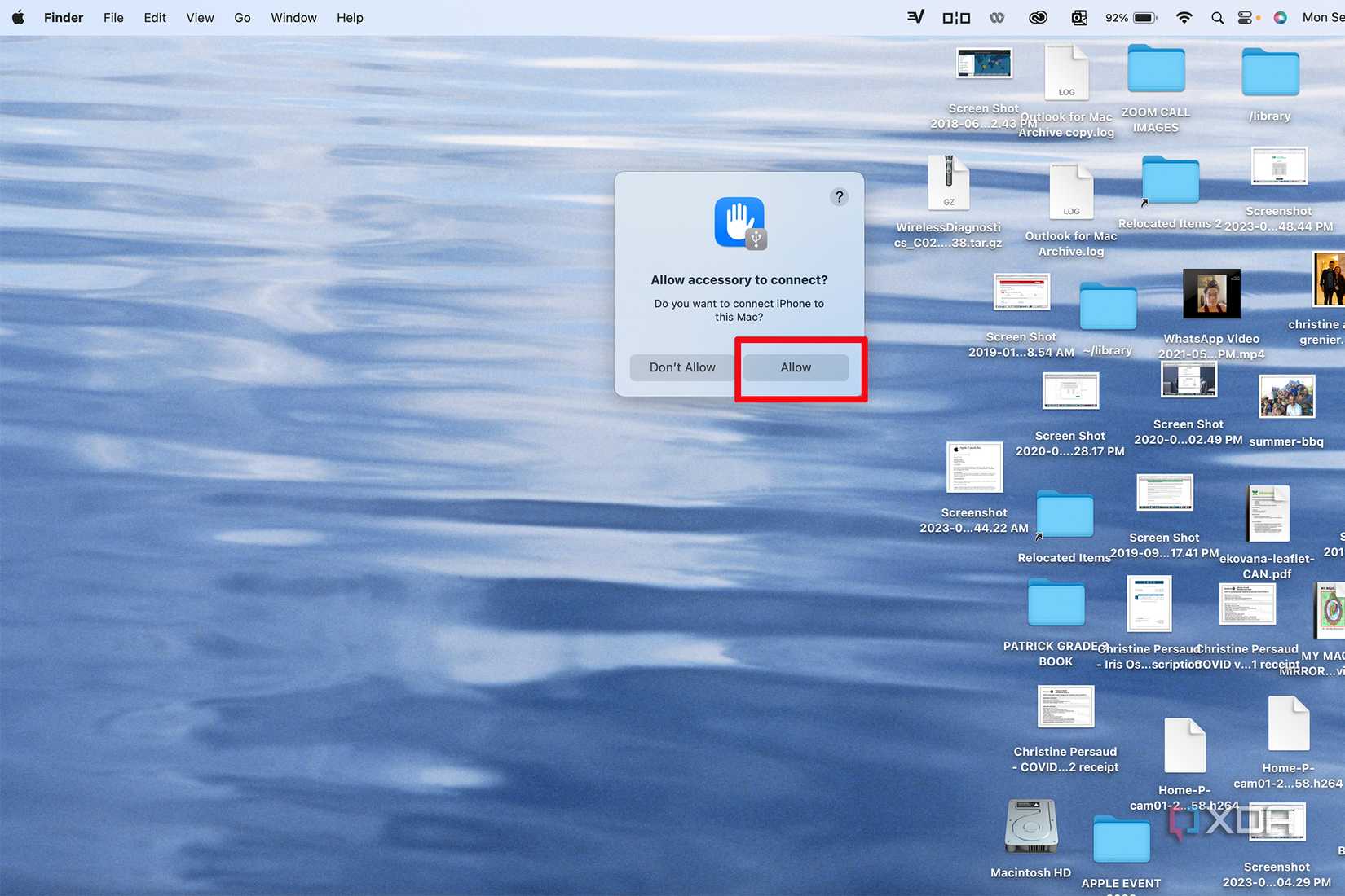 A MacBook screen showing "allow accessory to connect" with Allow selected.