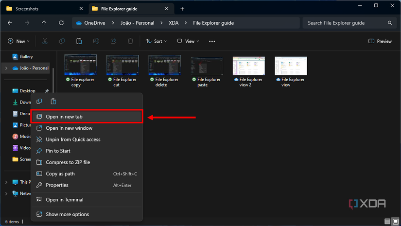 Screenshot of File Explorer in Windows 11 with the Open in new tab button highlighted in the context menu