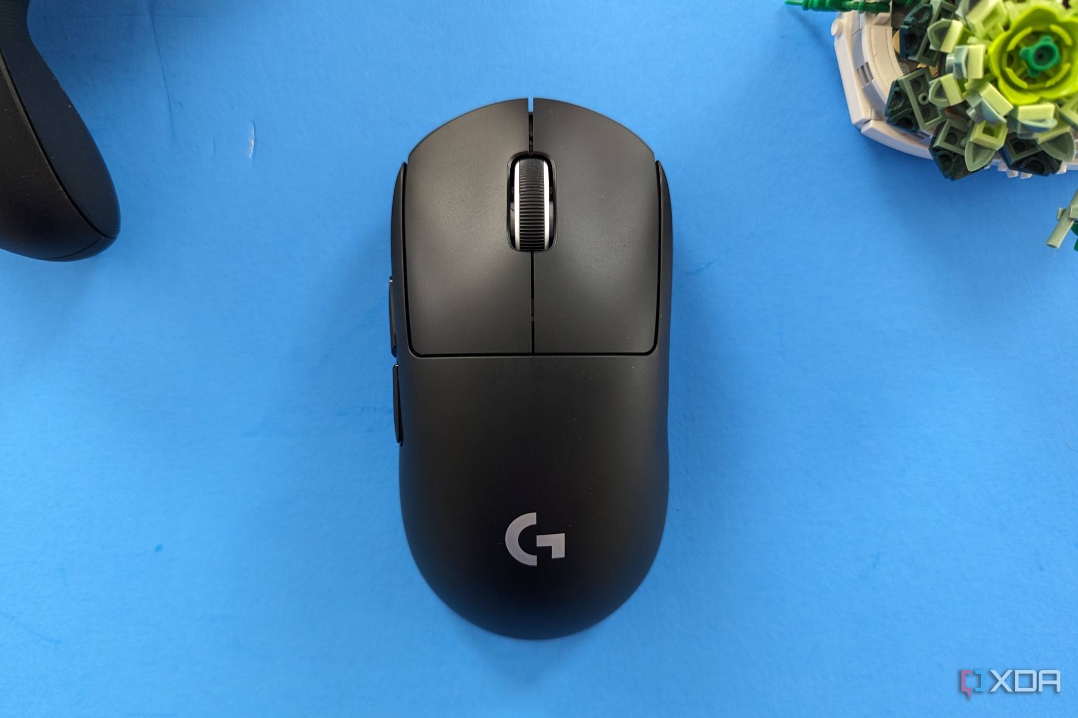 G Pro X Superlight 2 sitting next to a plant