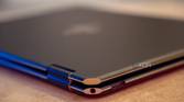 Corner of laptop showing a headphone jack