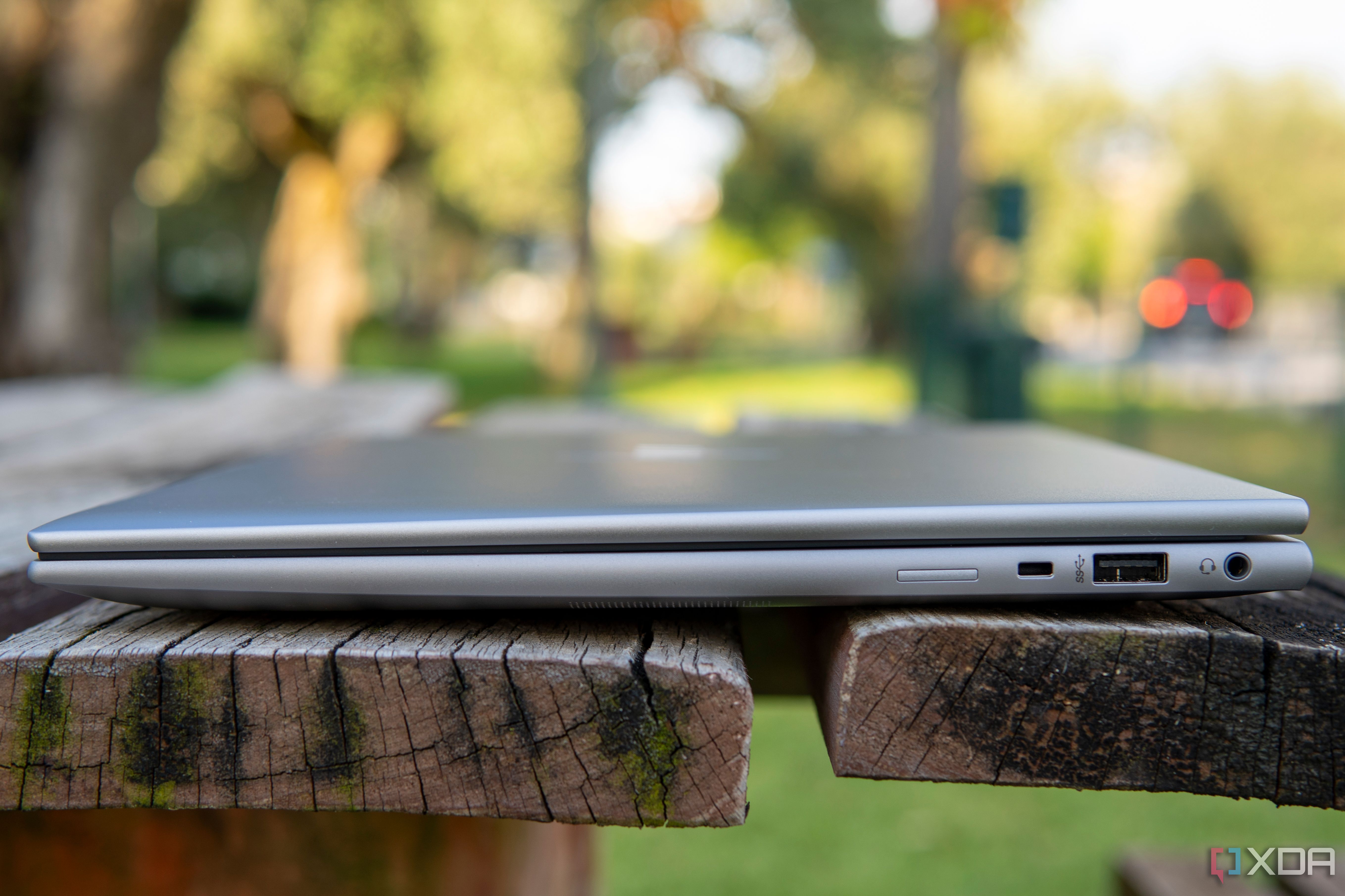 Right-side view of the HP ZBook Firefly 14 G10 showing a USB Type-A port, headphone jack, and a Kensignton lock slot.