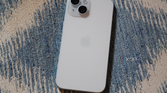 The back of a blue iPhone 15.