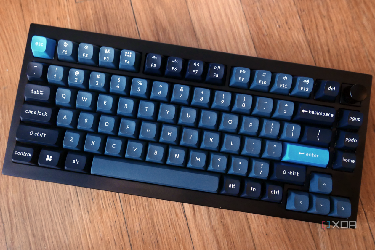 Keychron Q1 Pro keyboard on a wooden floor