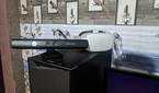 An Xbox 360 Kinect (V1) and a Meta Quest 2 placed on top of a PC