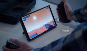 Lenovo Legion Go on a table while being played with detachable controllers