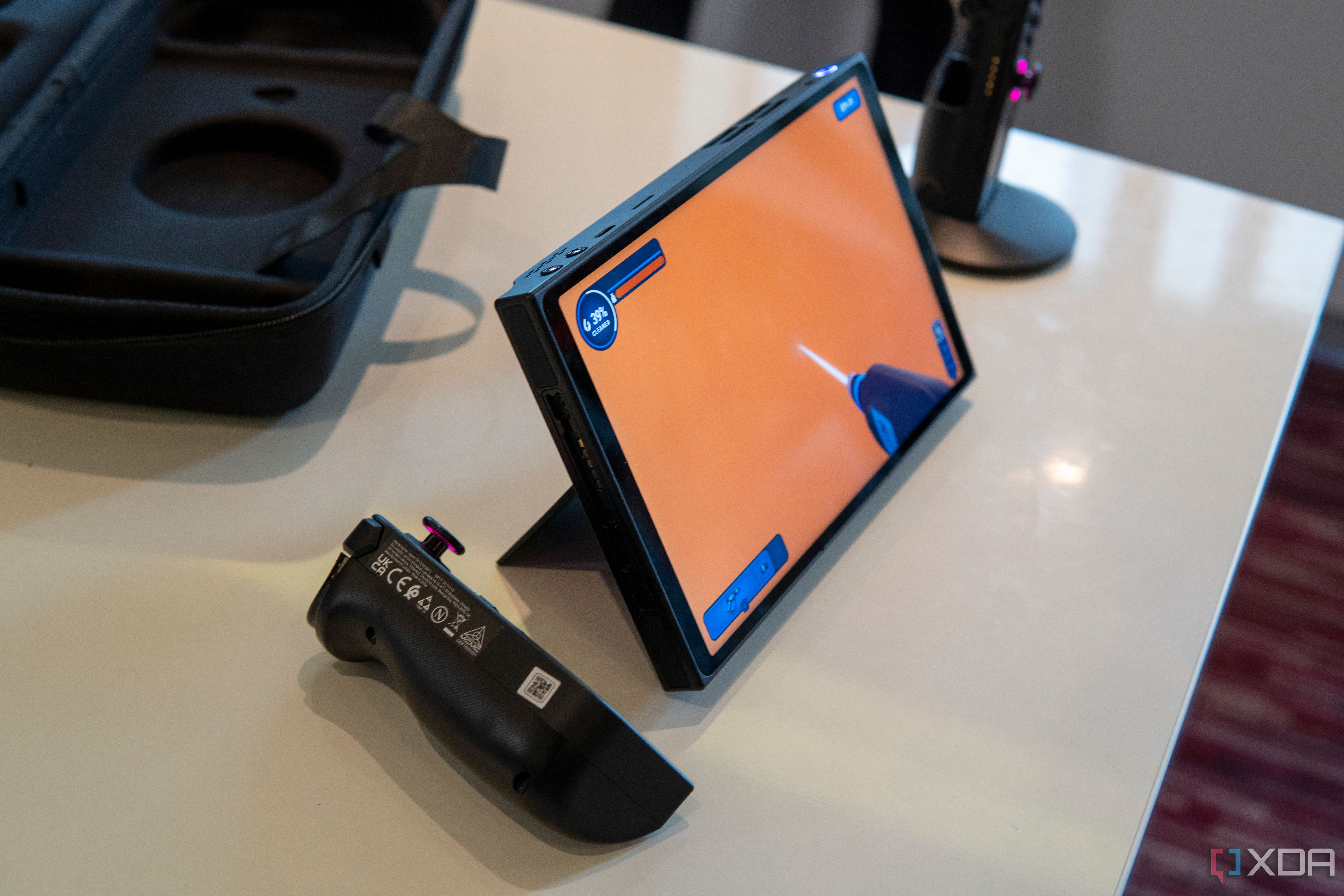Angled view of the Lenovo legion Go with the controllers detached and the kickstand deployed