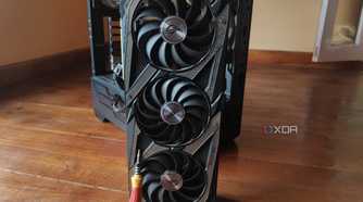 A screwdriver resting on an RTX 3080 Ti, with an MSI MAG Forge 110R in the background.