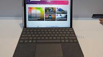 A Surface Go 4 displaying the XDA website.