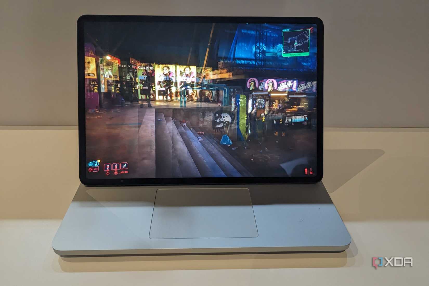 Surface Laptop Studio 2 with video game playing.