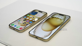 Apple iPhone 15 Pro and Pro Max side by side on mat.