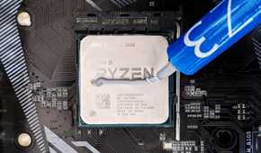 An photo showing an AMD Ryzen 5 3600 CPU with thermal paste.