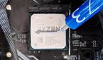 An photo showing an AMD Ryzen 5 3600 CPU with thermal paste.