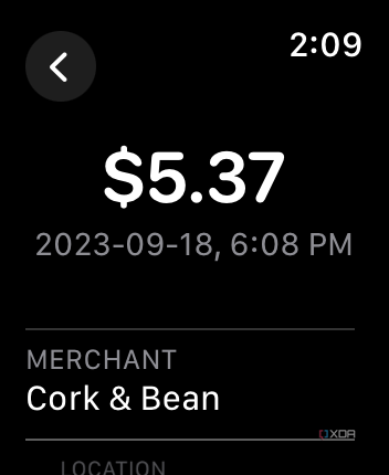 Apple Wallet app on Apple Watch showing a transaction with the amount, date, and merchant.