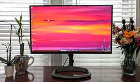 Cooler Master Tempest Monitor GP27Q sitting on a desk