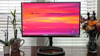 Cooler Master Tempest Monitor GP27Q sitting on a desk