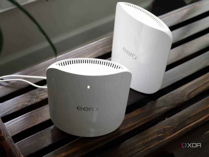 Eero Max 7 nodes from above on a wooden bench