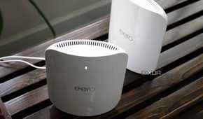 Eero Max 7 nodes from above on a wooden bench