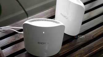 Eero Max 7 nodes from above on a wooden bench