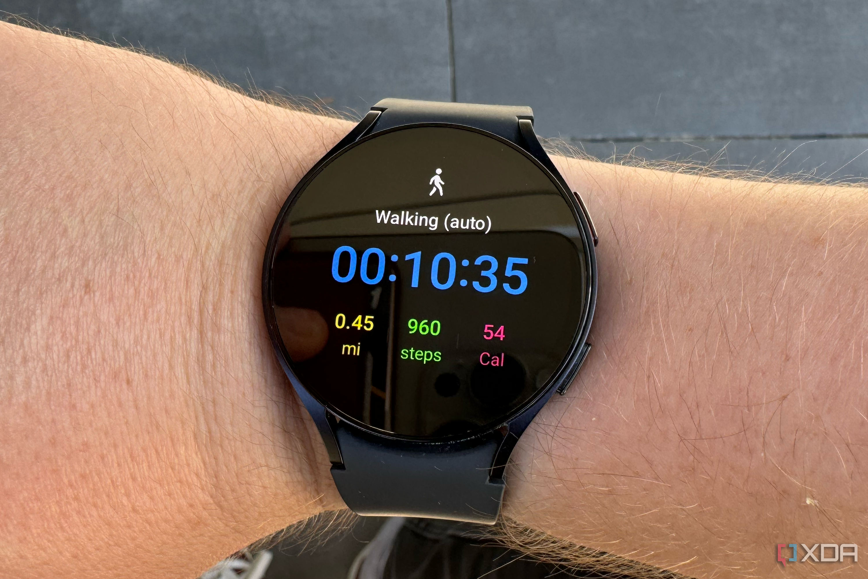 The Galaxy Watch 6 on a wrist showing a walking workout.