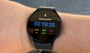 The Galaxy Watch 6 on a wrist showing a walking workout.