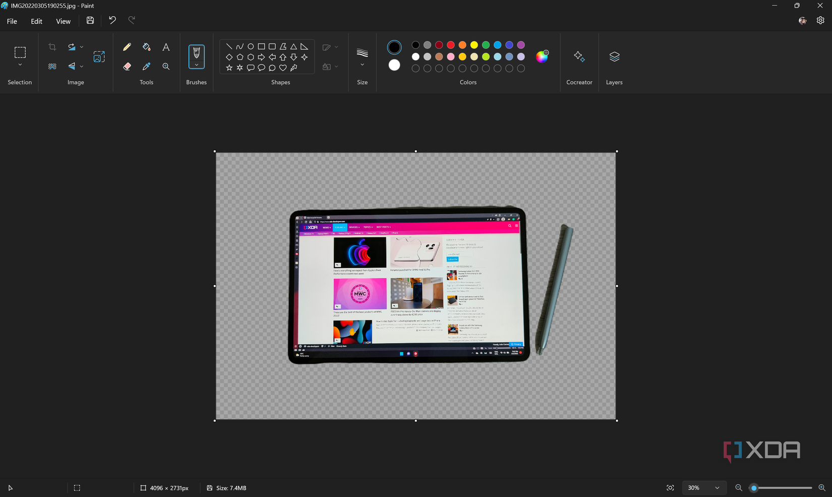 Screenshot of paint with a picture of a tablet with the background removed