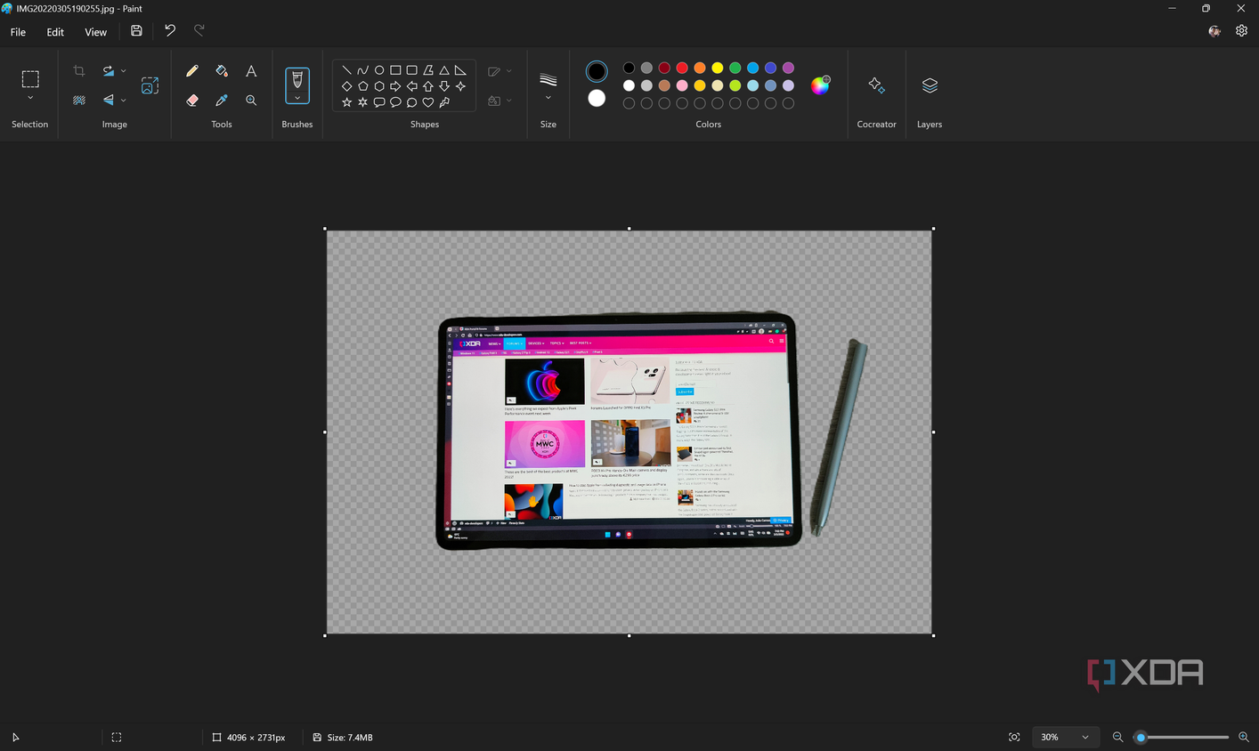 Screenshot of paint with a picture of a tablet with the background removed