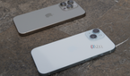 An iPhone 15 and iPhone 15 Pro Max on a tabletop.