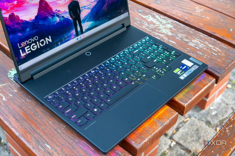 Angled view of the bottom half of the Lenovo Legion 9i which is resting on a wooden table