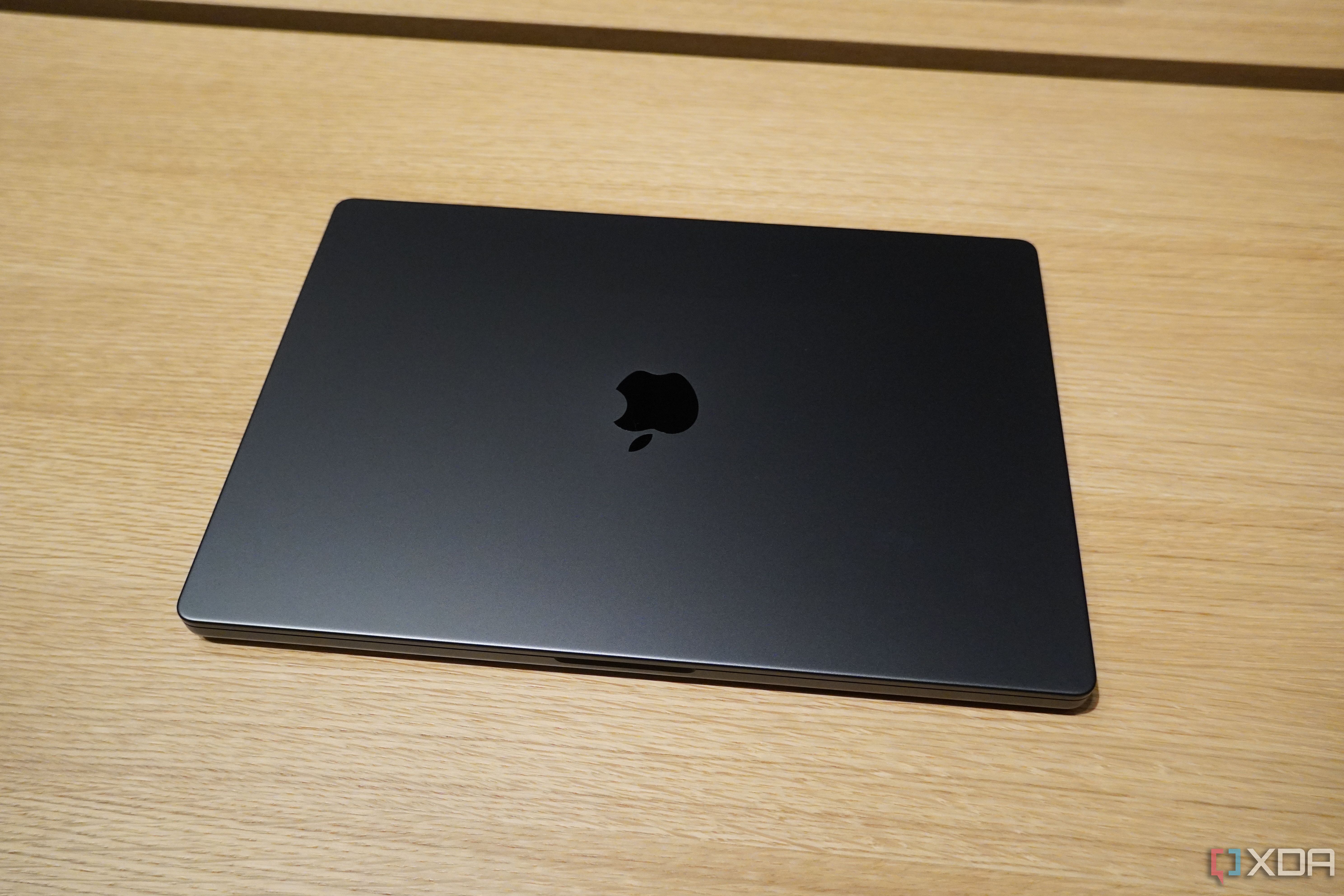 The M3 MacBook Pro in Space Black.