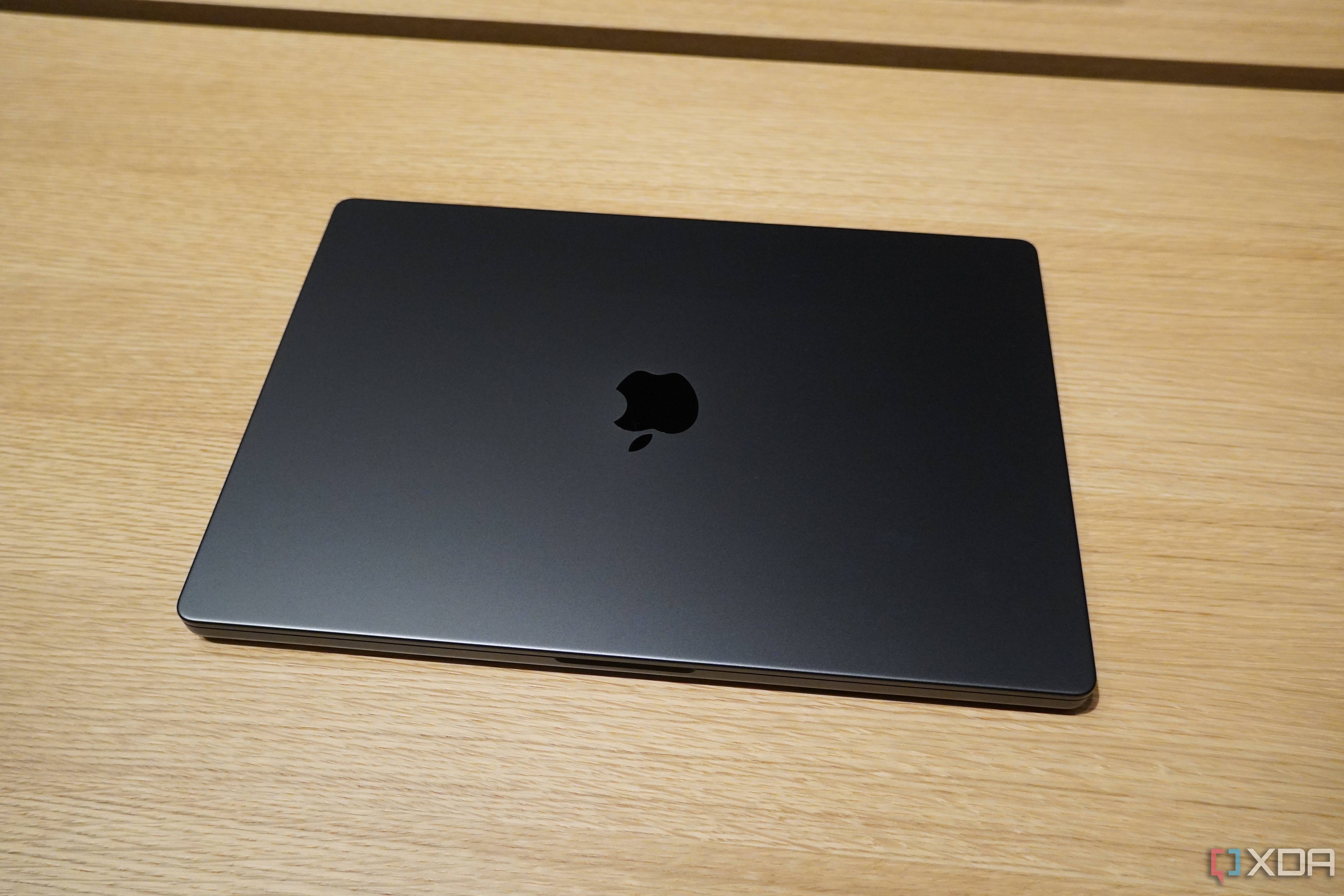 The M3 MacBook Pro in Space Black.