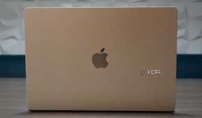 A MacBook Air opened on a table.